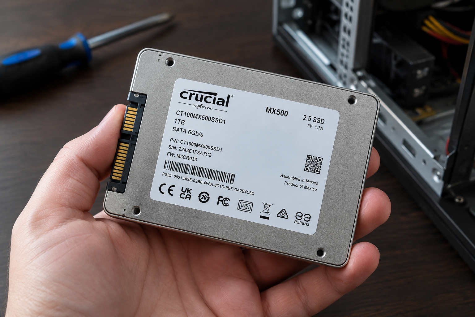 Close-up of a Crucial SSD label showing the serial number location
